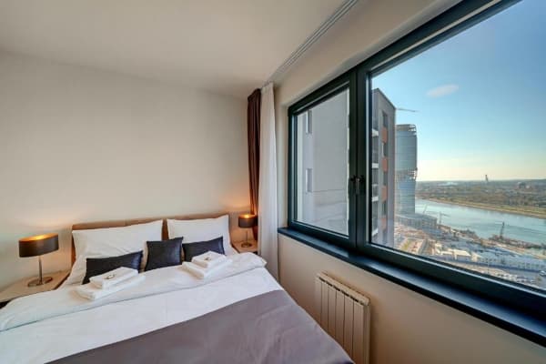 bedroom with a view of the river in Belgrade